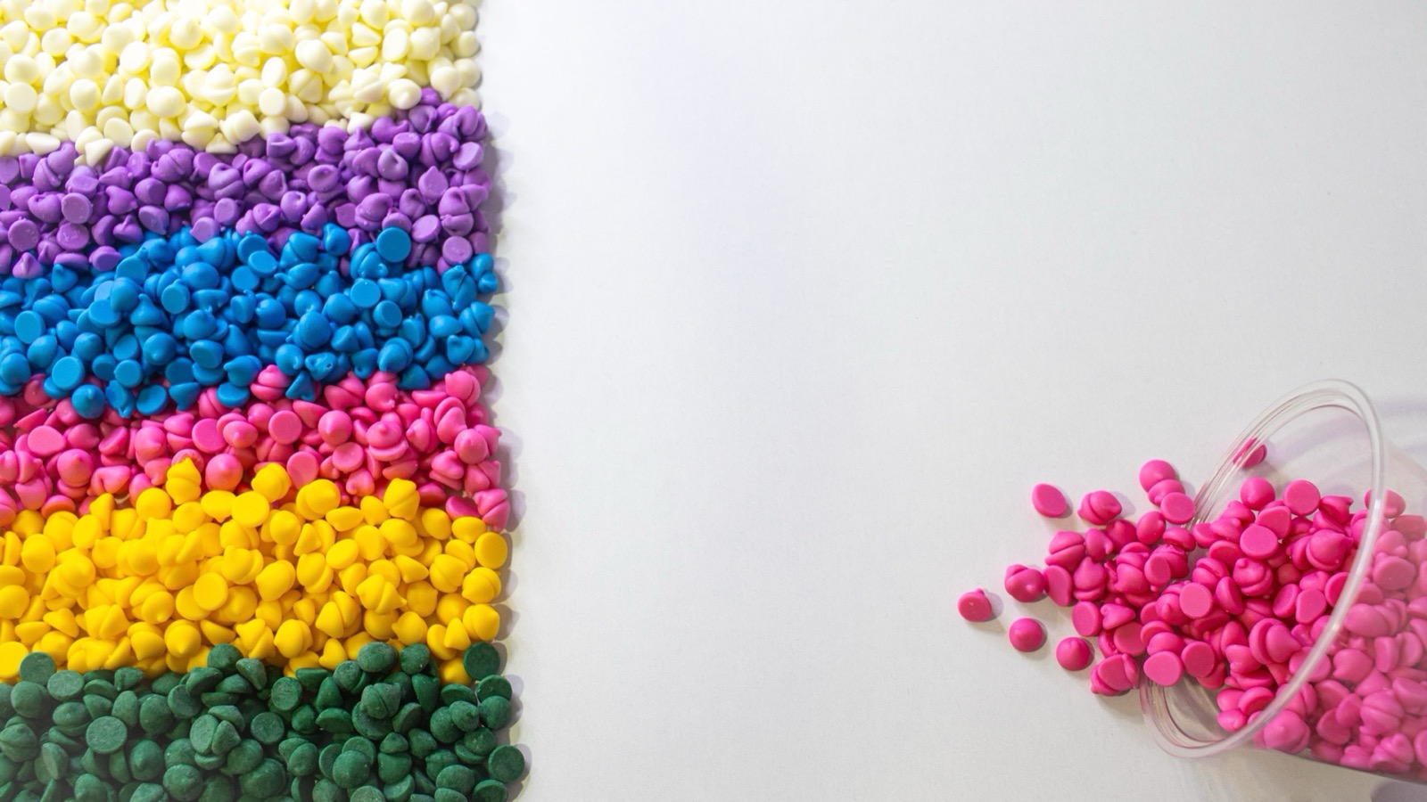 Colorful plastic pellets used to illustrate pellet loss prevention in polymer supply chains