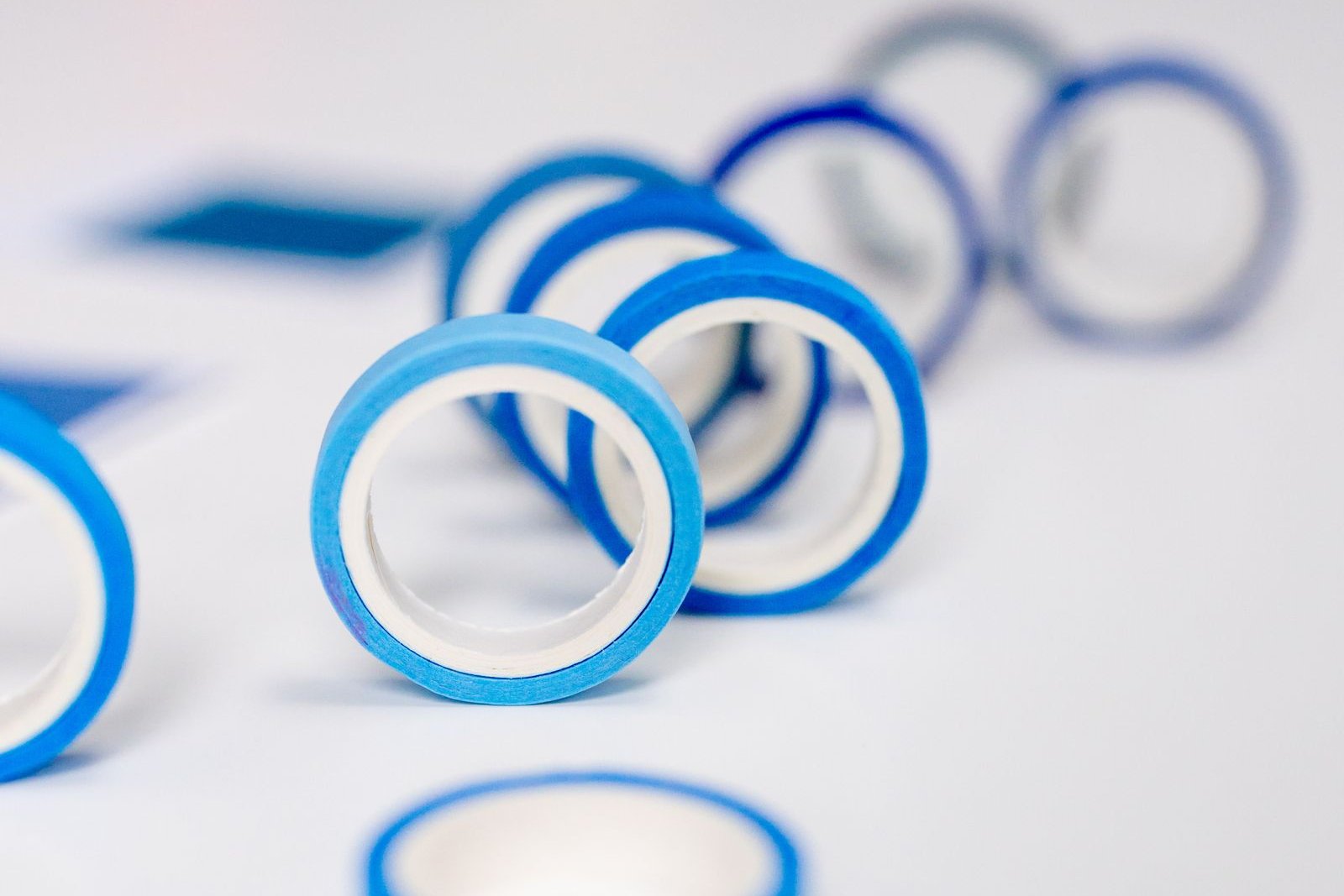 SIS Diblock Content: Buyer Checks Blue adhesive tape rolls illustrating applications discussed in the SIS diblock content buyer guide